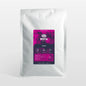 White coffee bag with a pink and black label on a white background