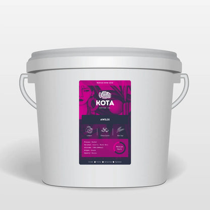 White container with a pink label featuring 'Kota Coffee Co' on a white background