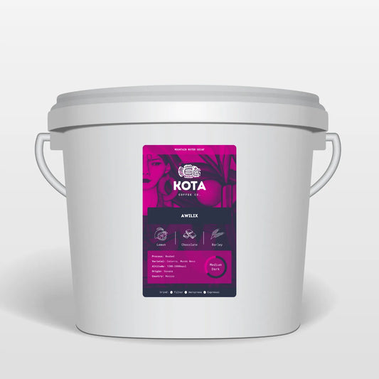 White container with a pink label featuring 'Kota Coffee Co' on a white background