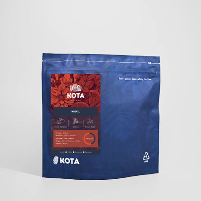 Kota coffee package with red label on a white background